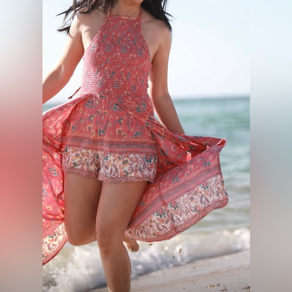 Floral Split front romper with attached shorts and smock halter top. - Picture 4 of 13